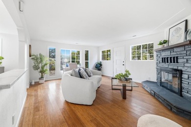 Ideally located on a quiet residential street in the highly - photo 4