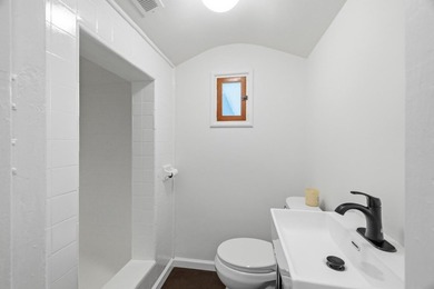 Ideally located on a quiet residential street in the highly - photo 8