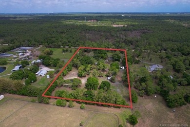 Rare 5-acre equestrian property in desirable Palm City Farms - photo 2