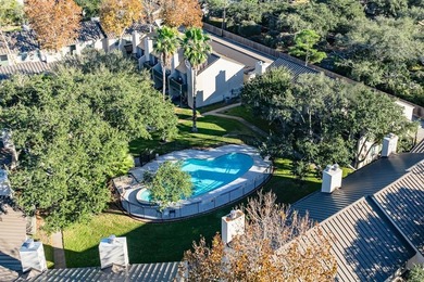 Boasting an exceptional view of the sparkling community pool - photo 6