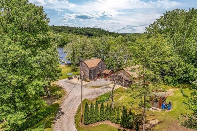 This stunning post-and-beam home on scenic Sennebec Pond offers - photo 2