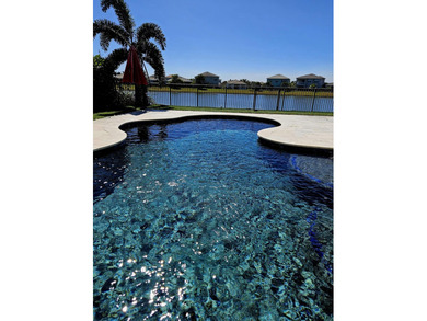 Lakefront living with a private heated saltwater pool in the - photo 8