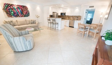 STUNNING RENOVATED! FIRST FLOOR WATERVIEW! Sparkling! Newly - photo 1