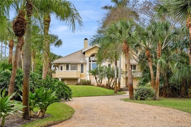 Framed by swaying palms and endless water views, this estate - photo 4