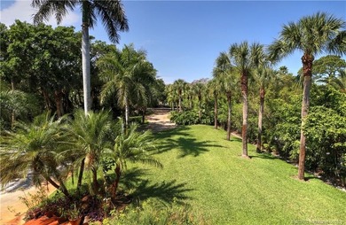 Framed by swaying palms and endless water views, this estate - photo 5