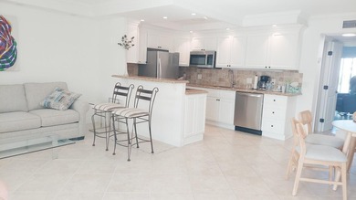 STUNNING RENOVATED! FIRST FLOOR WATERVIEW! Sparkling! Newly - photo 7