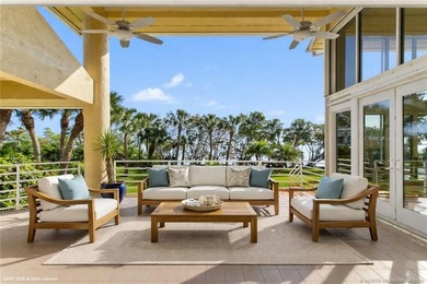 Framed by swaying palms and endless water views, this estate - photo 8