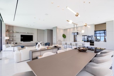 Experience oceanfront luxury living at its finest in this