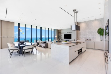 Experience oceanfront luxury living at its finest in this