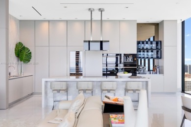 Experience oceanfront luxury living at its finest in this