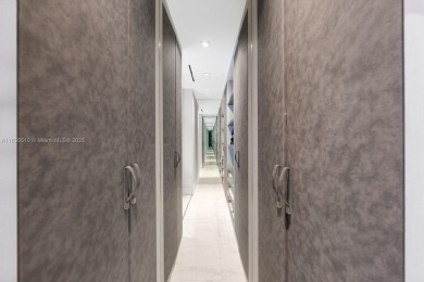 Experience oceanfront luxury living at its finest in this