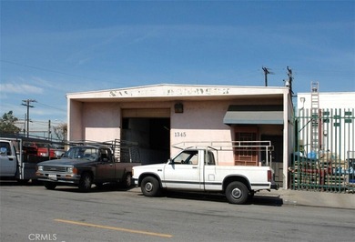 Exceptional freestanding industrial building featuring - photo 1