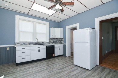 Completely remodeled from start to finish, this striking - photo 8