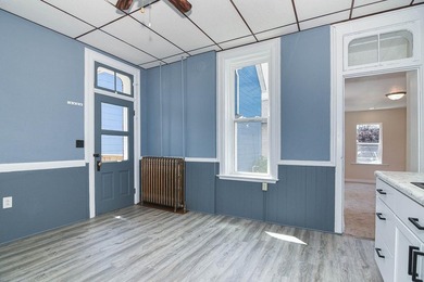 Completely remodeled from start to finish, this striking - photo 9