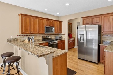 Discover this beautifully updated 3-bedroom cluster home in the - photo 11