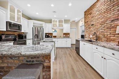 Beautifully remodeled home featuring a large living room and - photo 13