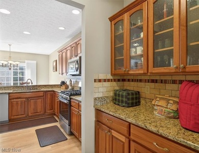 Discover this beautifully updated 3-bedroom cluster home in the - photo 16