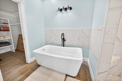 Beautifully remodeled home featuring a large living room and - photo 18