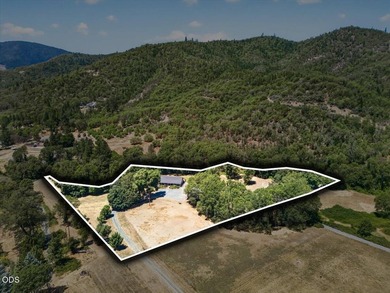 Picturesque Creekfront Farmhouse on 5.03 fully fenced acres! - photo 37