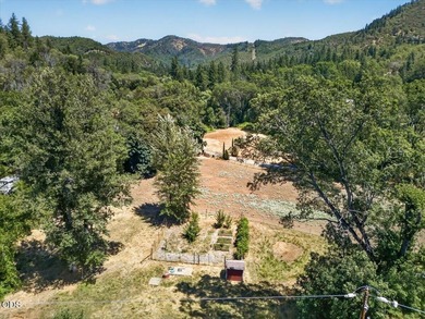 Picturesque Creekfront Farmhouse on 5.03 fully fenced acres! - photo 39