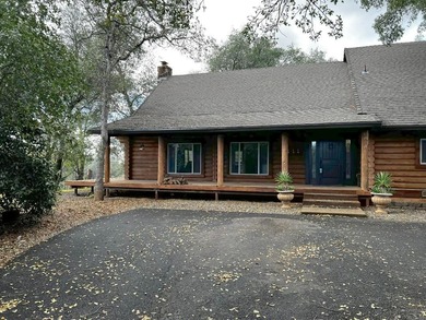 Discover peaceful country living. This two -level Custom log - photo 2