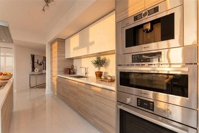 Experience the pinnacle of coastal luxury in this fully - photo 7