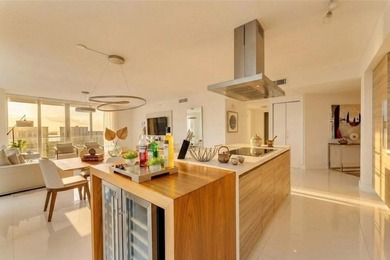 Experience the pinnacle of coastal luxury in this fully - photo 9