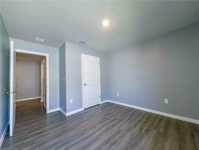 Welcome to this 4-bedroom, 2-bathroom home, perfect for families - photo 12