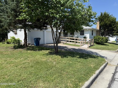 Perfectly situated on a corner lot with convenient access to