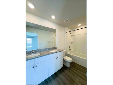 Welcome to this 4-bedroom, 2-bathroom home, perfect for families - photo 22