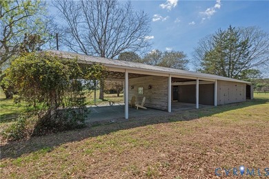 A gently meandering lane lined with mature cedars and live oaks - photo 38