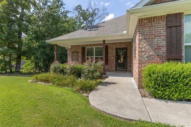 A beautifully situated all brick home on a level corner lot - photo 1