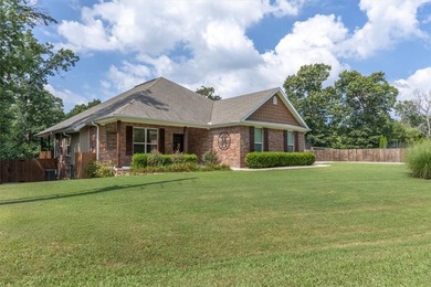 A beautifully situated all brick home on a level corner lot - photo 2