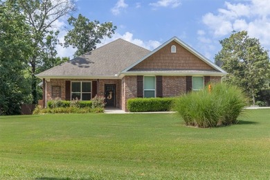 A beautifully situated all brick home on a level corner lot - photo 3