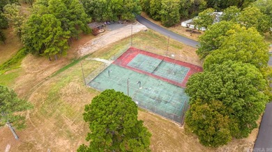 Tucked among the trees in the desirable Diamondhead community - photo 17