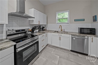 Step into timeless charm with modern luxury in this beautifully - photo 6