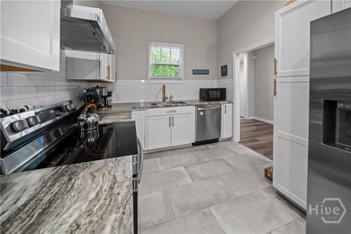 Step into timeless charm with modern luxury in this beautifully - photo 7