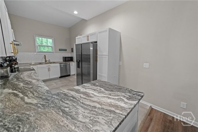 Step into timeless charm with modern luxury in this beautifully - photo 9