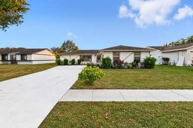 Beautiful 1-story home with 3 bedrooms and 2 bathrooms, perfect - photo 1