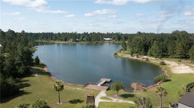Beautiful lot on the lake at Lakeside at Longwood, a quiet - photo 7