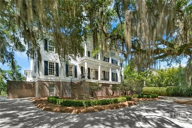 Rare offering Nestled beneath a canopy of ancient oaks draped in - photo 5