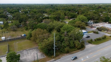 This .48-acre parcel is centrally located between two I-95 - photo 2