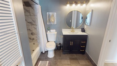 This FULLY FURNISHED AND COMPLETELY RENOVATED 1-bedroom