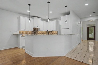 Welcome home to this charming Southern-style residence nestled - photo 13