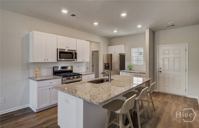 This new Albany home design features a convenient layout with - photo 3