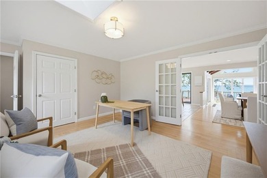 Tucked away on a quiet cul-de-sac, this exceptional waterfront - photo 11