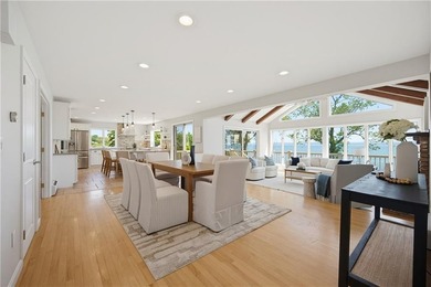 Tucked away on a quiet cul-de-sac, this exceptional waterfront - photo 12