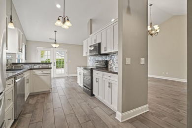 Welcome to 262 Palladium Drive, a beautifully maintained custom - photo 13