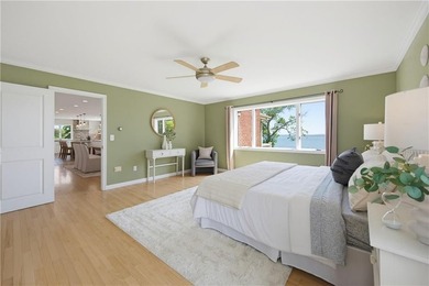 Tucked away on a quiet cul-de-sac, this exceptional waterfront - photo 13