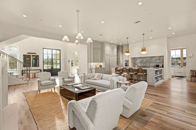 Nestled on a sprawling one-acre lot within the prestigious gated - photo 17